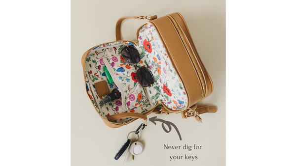 Photo of interior of the Poppy bag, highlighting the attached key leash.