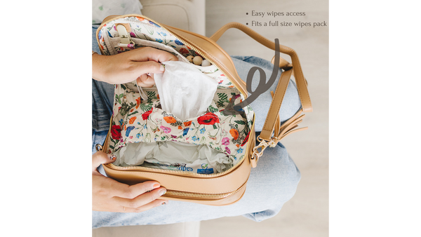 Photo of interior of the Poppy bag, highlighting the baby wipes pocket.