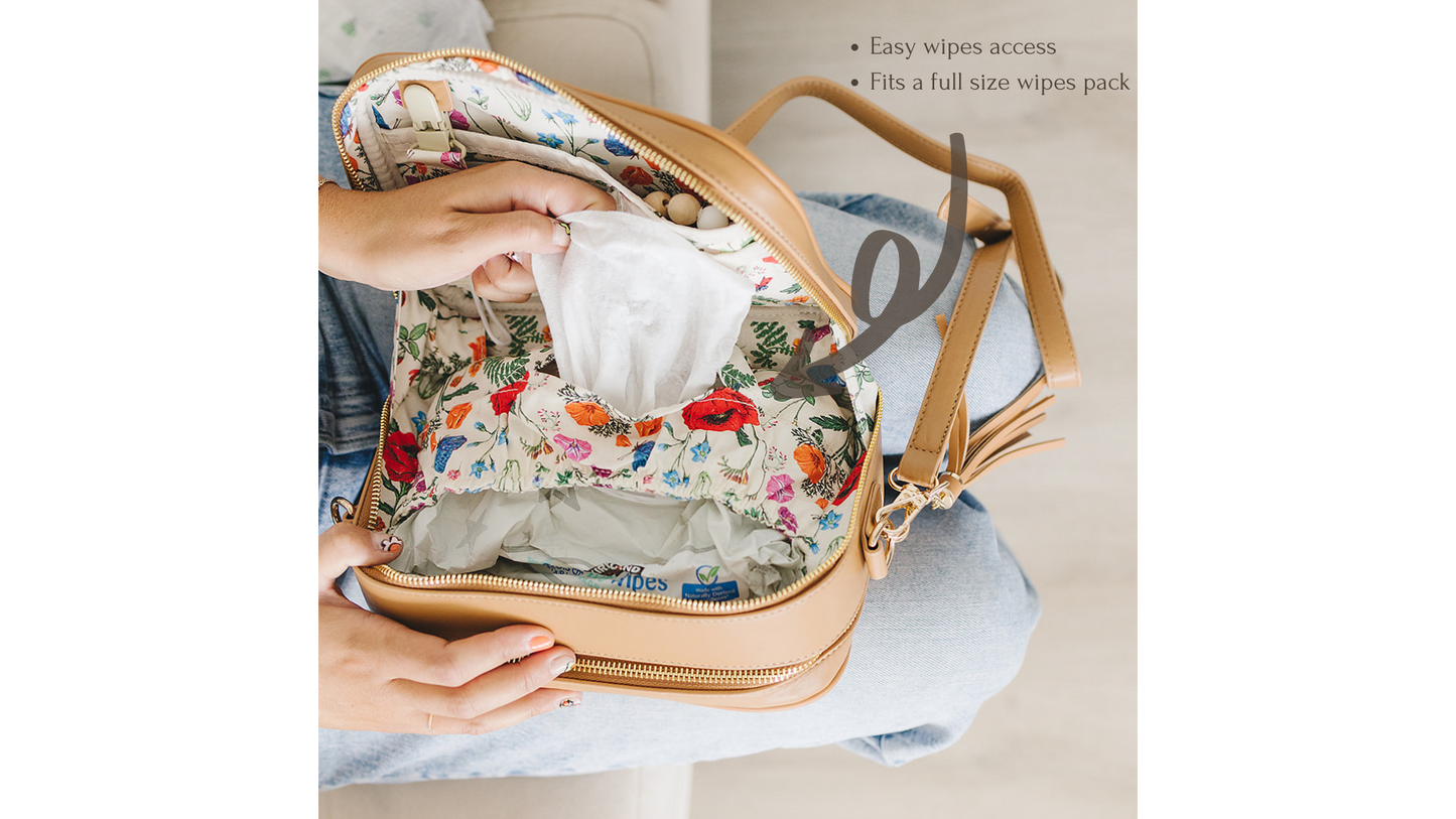 Photo of interior of the Poppy bag, highlighting the baby wipes pocket.