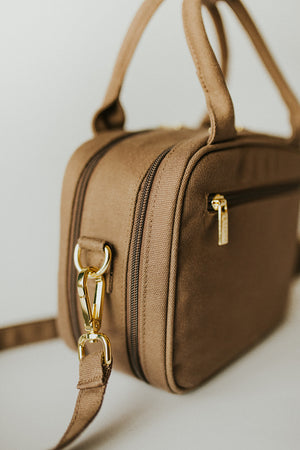 Bronze everyday poppy handbag with top handles and a strap, side view
